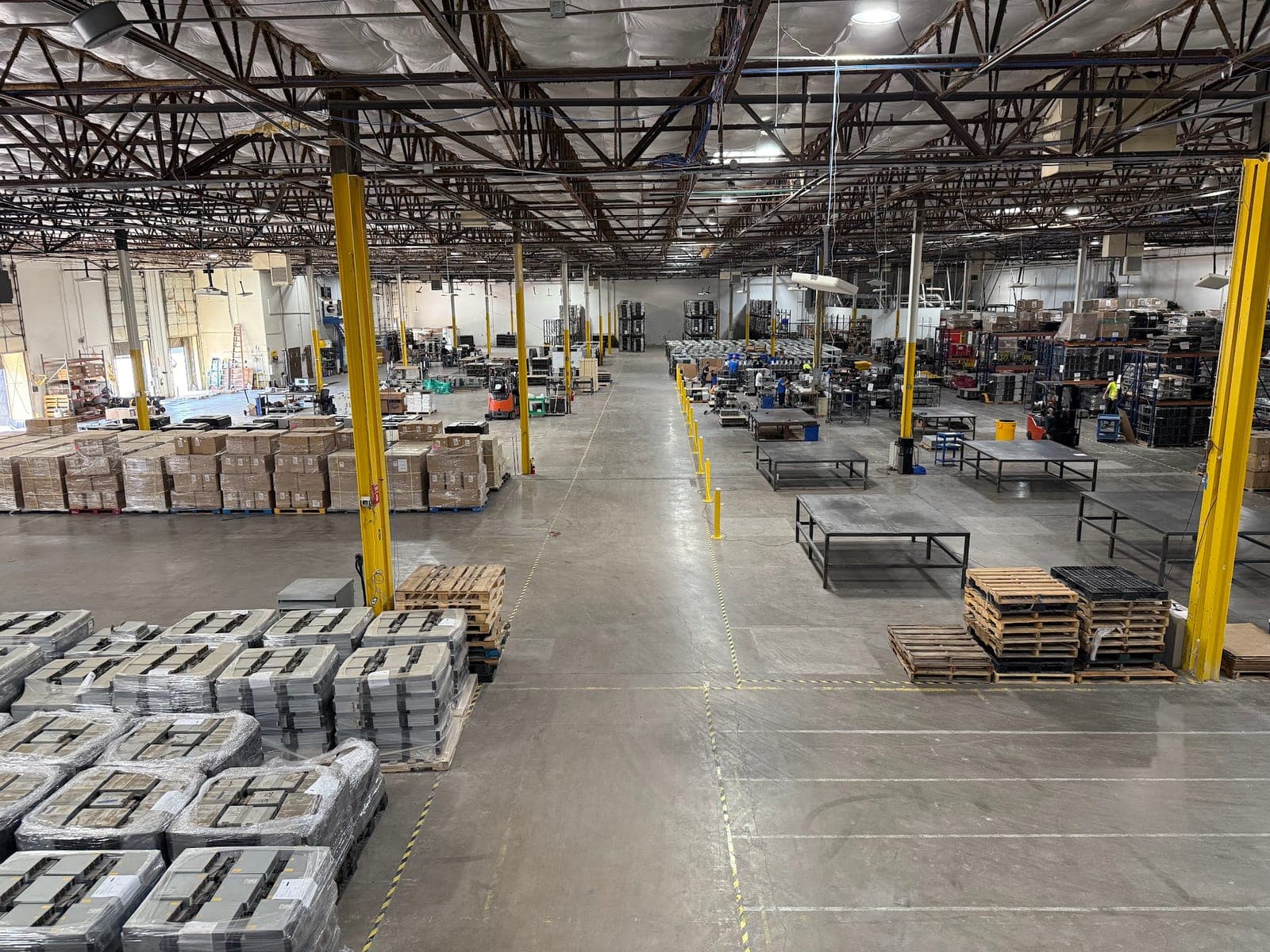 The open production floor of the ACS facility, looking down its long axis